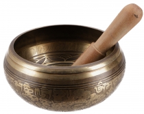 Singing bowl from Nepal, handmade from solid brass with ornaments..